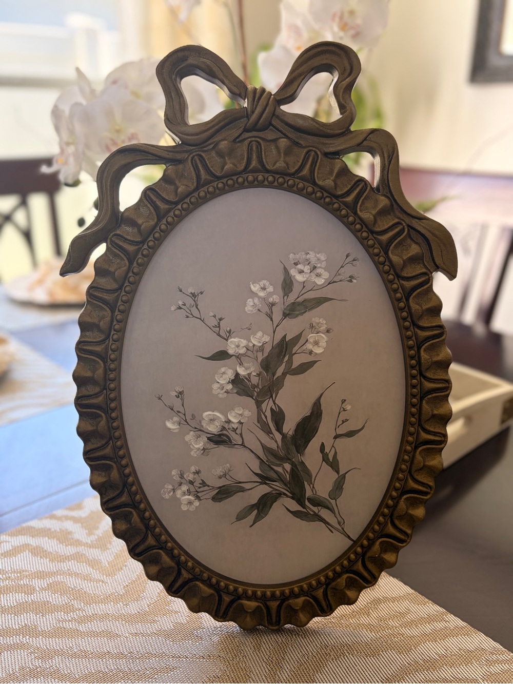 Vintage looking Gold Bow Frame Wall Art with White Floral - 18” x 12”